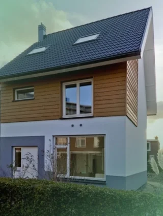 Vrijstaand huis met houten gevelbekleding